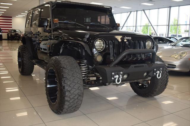 used 2015 Jeep Wrangler Unlimited car, priced at $22,777