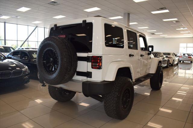 used 2015 Jeep Wrangler Unlimited car, priced at $25,977