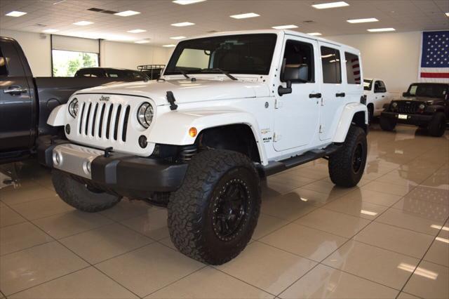 used 2015 Jeep Wrangler Unlimited car, priced at $25,977