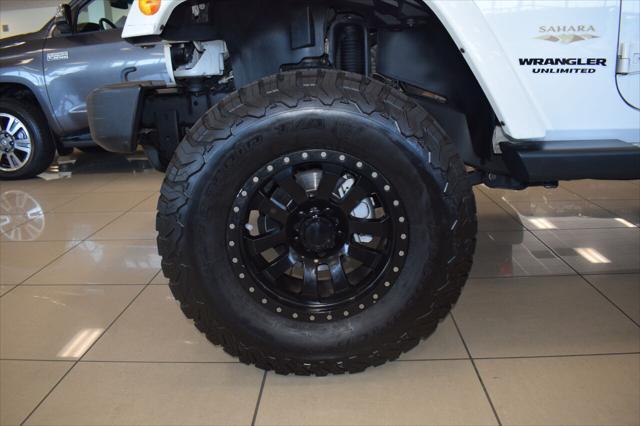 used 2015 Jeep Wrangler Unlimited car, priced at $26,499