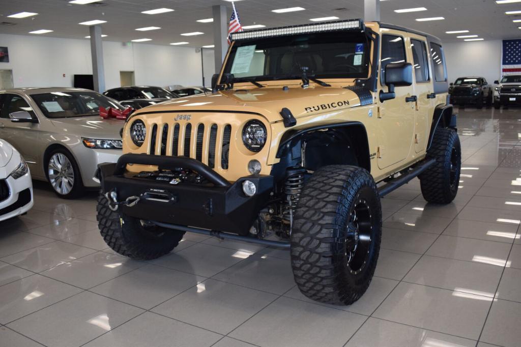 used 2014 Jeep Wrangler Unlimited car, priced at $23,977