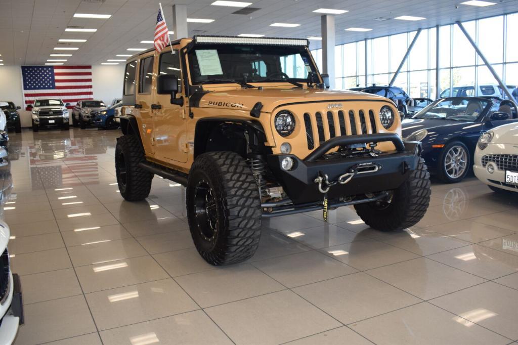 used 2014 Jeep Wrangler Unlimited car, priced at $24,888