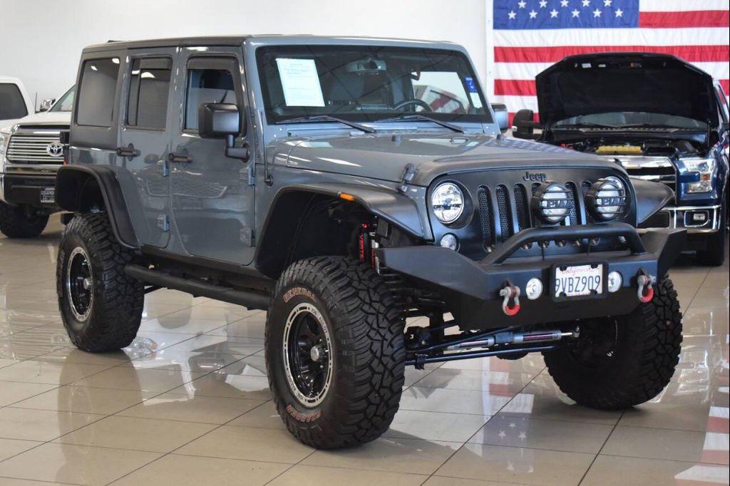 used 2014 Jeep Wrangler Unlimited car, priced at $24,997