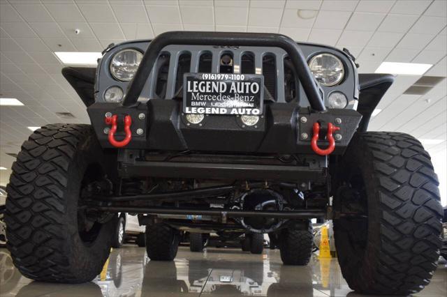 used 2014 Jeep Wrangler Unlimited car, priced at $24,888
