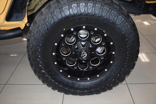 used 2014 Jeep Wrangler Unlimited car, priced at $23,777