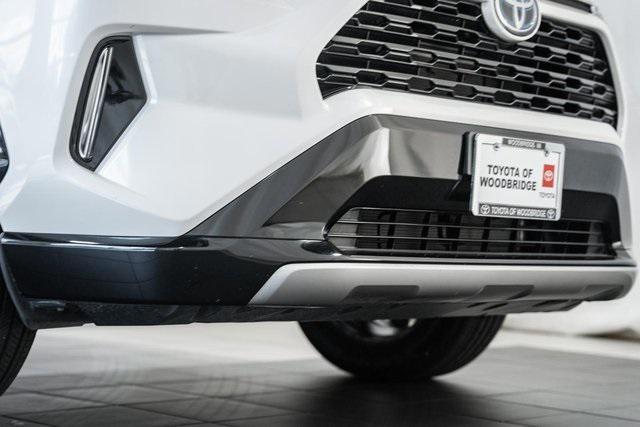 used 2022 Toyota RAV4 Hybrid car, priced at $34,000