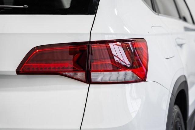 used 2024 Volkswagen Taos car, priced at $20,000