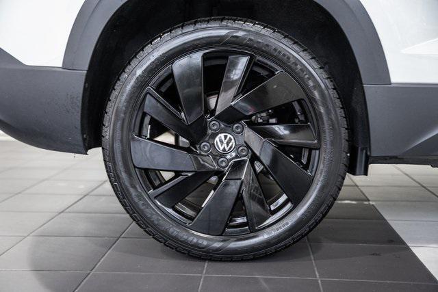 used 2024 Volkswagen Taos car, priced at $20,000