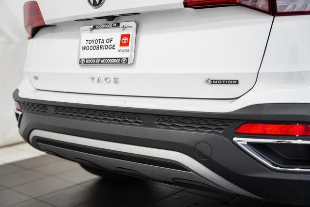 used 2024 Volkswagen Taos car, priced at $20,000