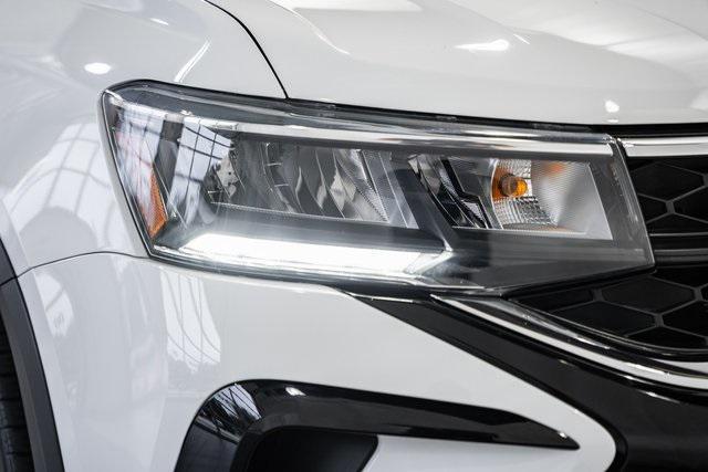 used 2024 Volkswagen Taos car, priced at $20,000