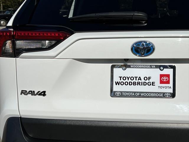 used 2023 Toyota RAV4 Hybrid car, priced at $28,000