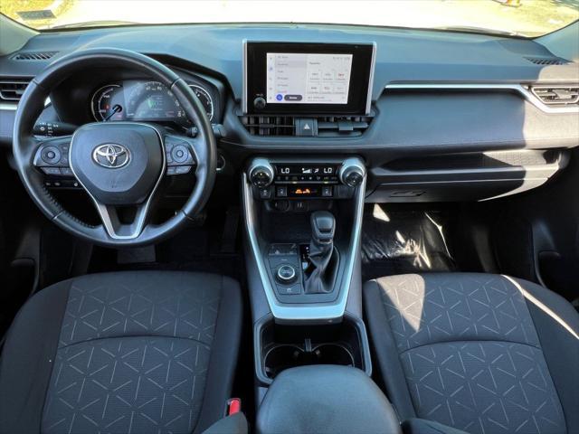 used 2023 Toyota RAV4 Hybrid car, priced at $28,000