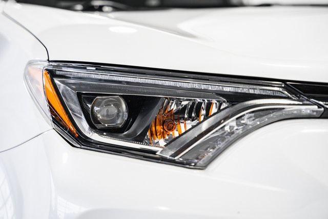 used 2018 Toyota RAV4 Hybrid car, priced at $27,000