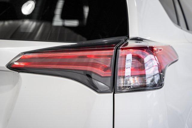 used 2018 Toyota RAV4 Hybrid car, priced at $27,000