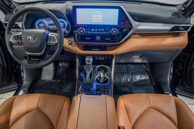 used 2025 Toyota Highlander Hybrid car, priced at $56,000