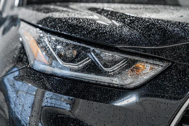 used 2025 Toyota Highlander Hybrid car, priced at $56,000