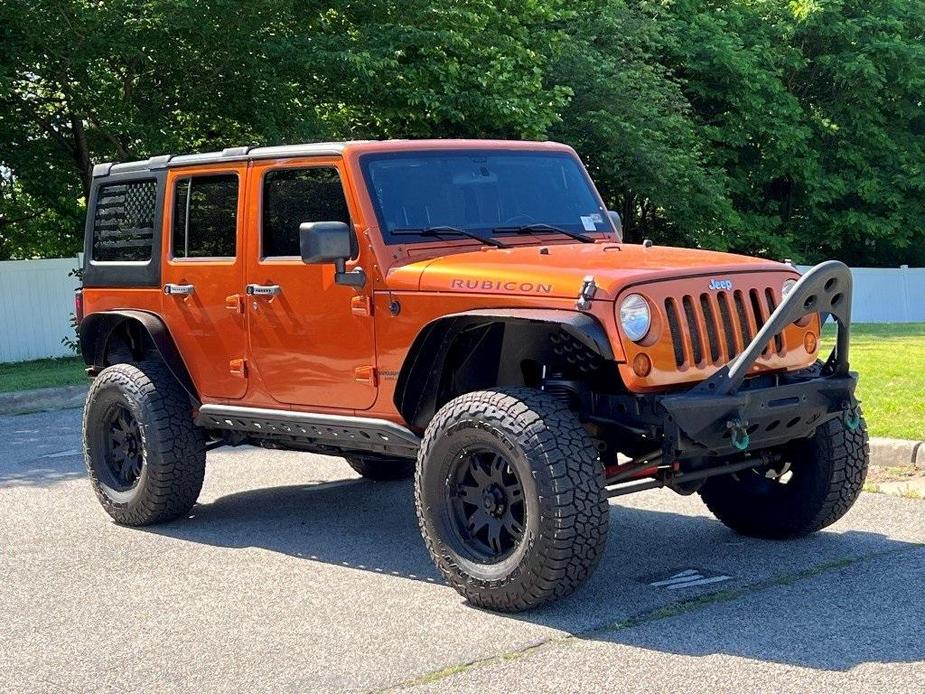 used 2011 Jeep Wrangler Unlimited car, priced at $13,676