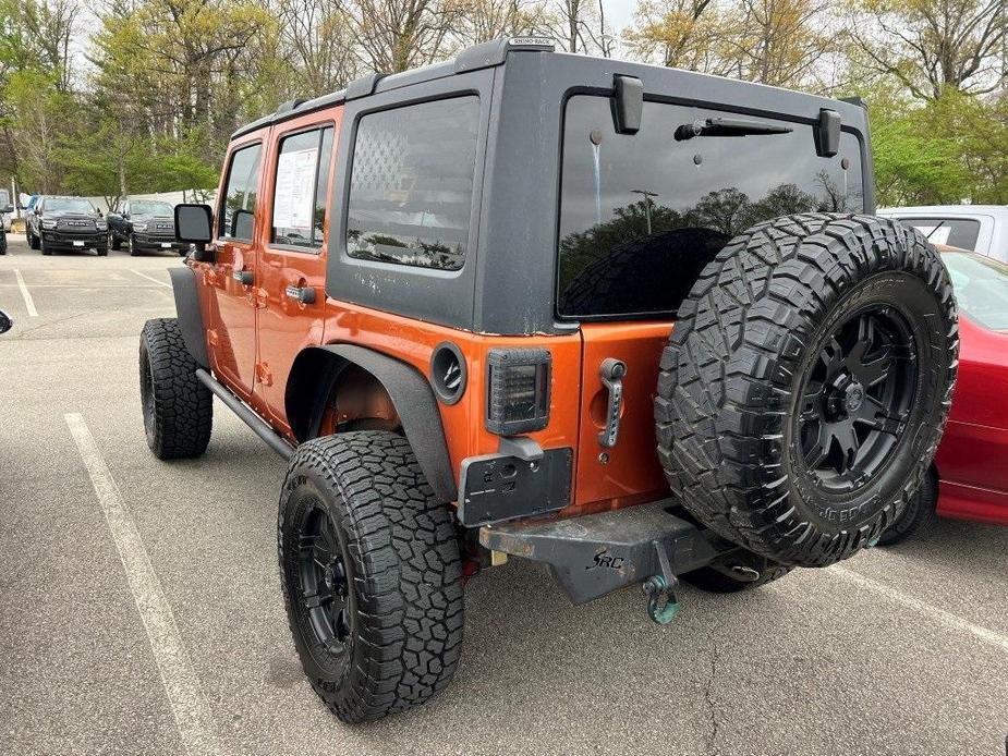 used 2011 Jeep Wrangler Unlimited car, priced at $14,205