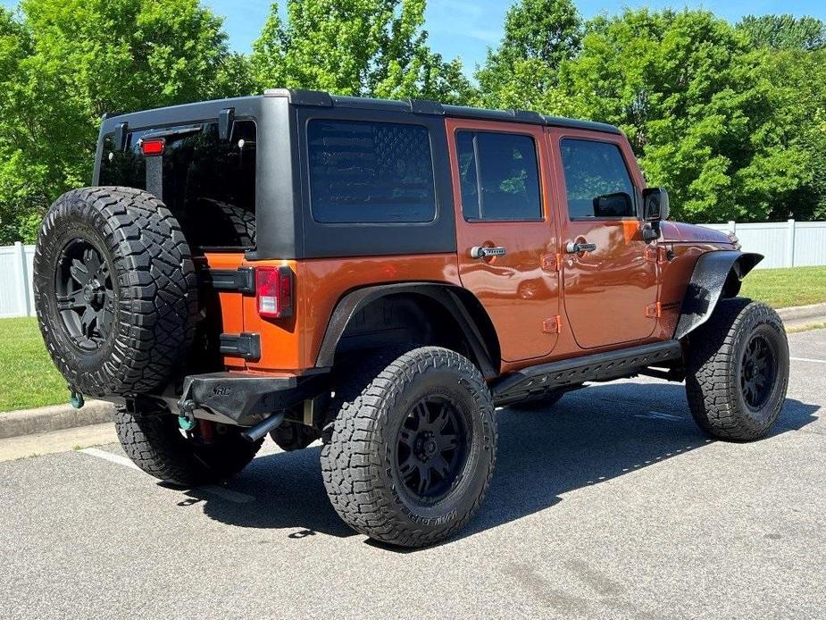 used 2011 Jeep Wrangler Unlimited car, priced at $13,770