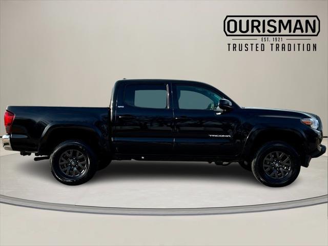 used 2021 Toyota Tacoma car, priced at $30,000