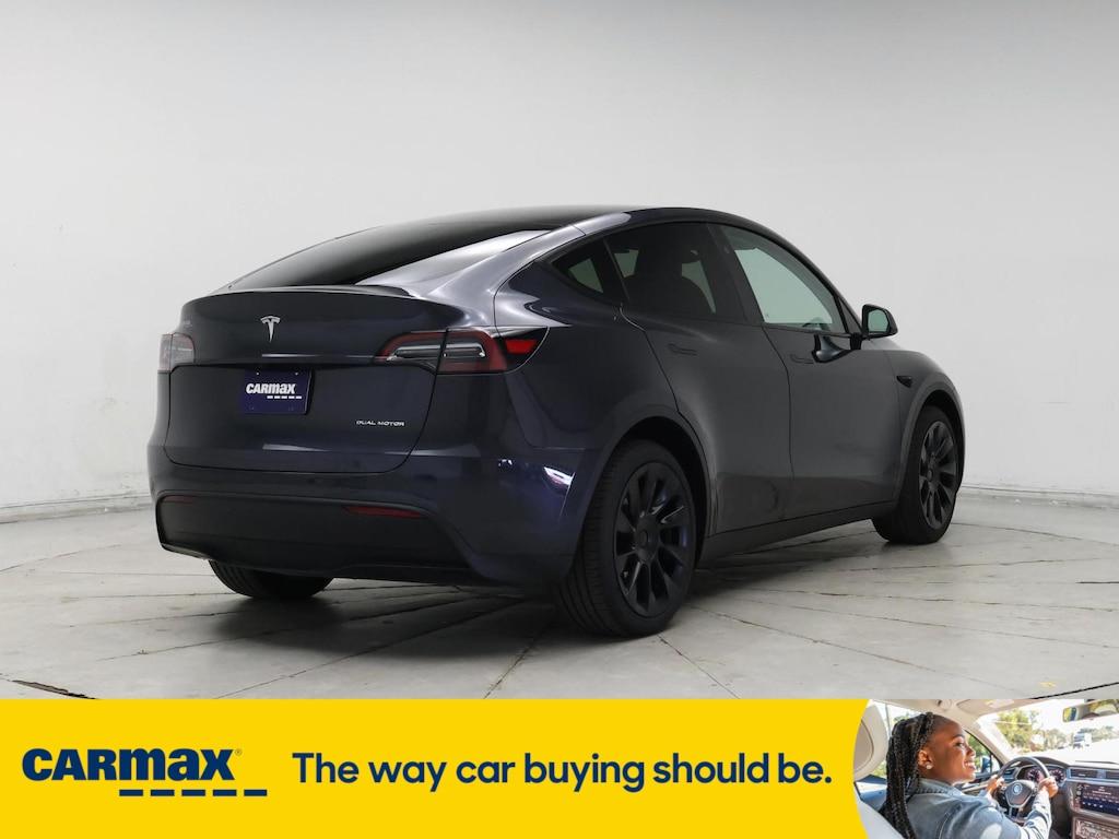 used 2024 Tesla Model Y car, priced at $39,998