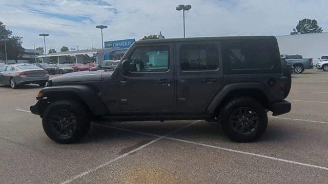 used 2024 Jeep Wrangler car, priced at $34,709