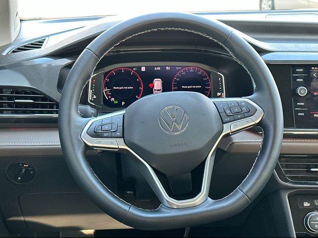 used 2023 Volkswagen Taos car, priced at $29,000