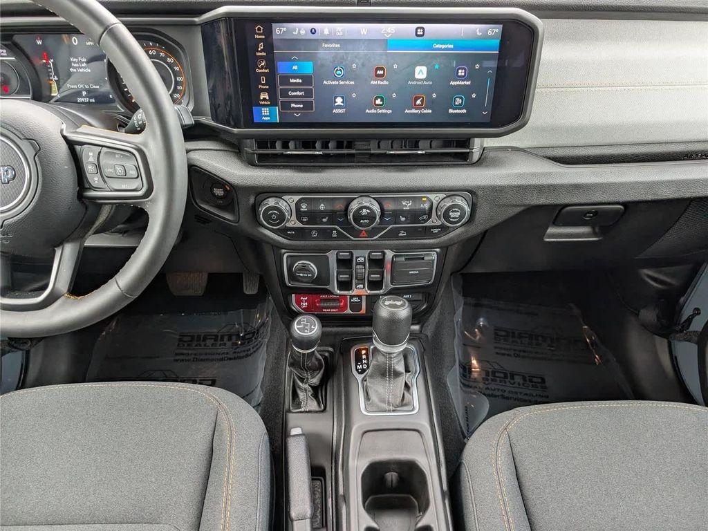 used 2024 Jeep Wrangler car, priced at $38,997
