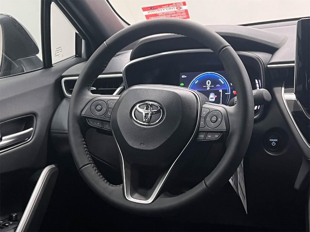 used 2025 Toyota Corolla Cross Hybrid car, priced at $37,161