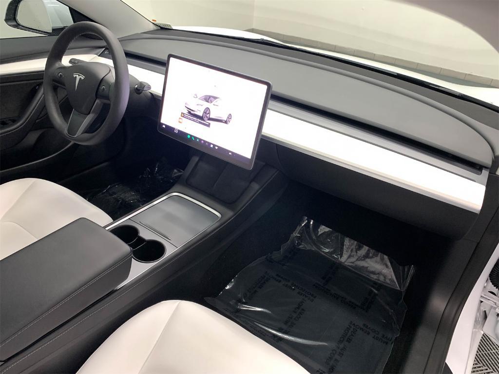 used 2023 Tesla Model 3 car, priced at $24,288