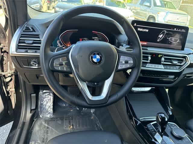 used 2023 BMW X4 car, priced at $44,999