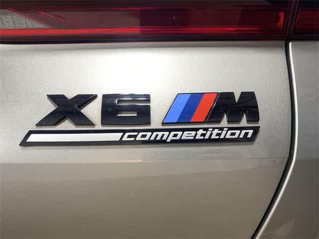 used 2022 BMW X6 M car, priced at $84,999