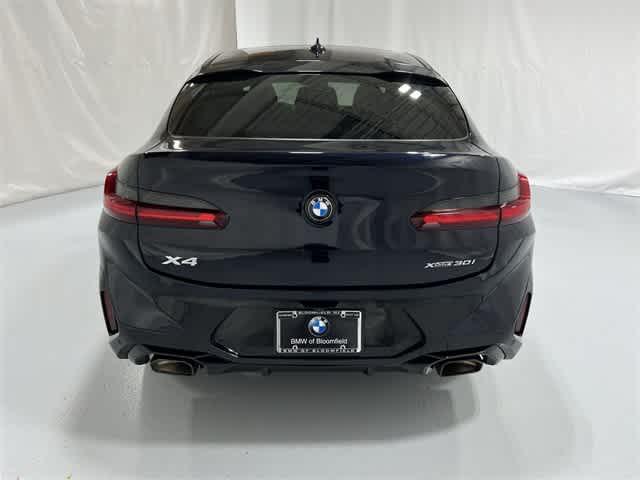 used 2023 BMW X4 car, priced at $42,498