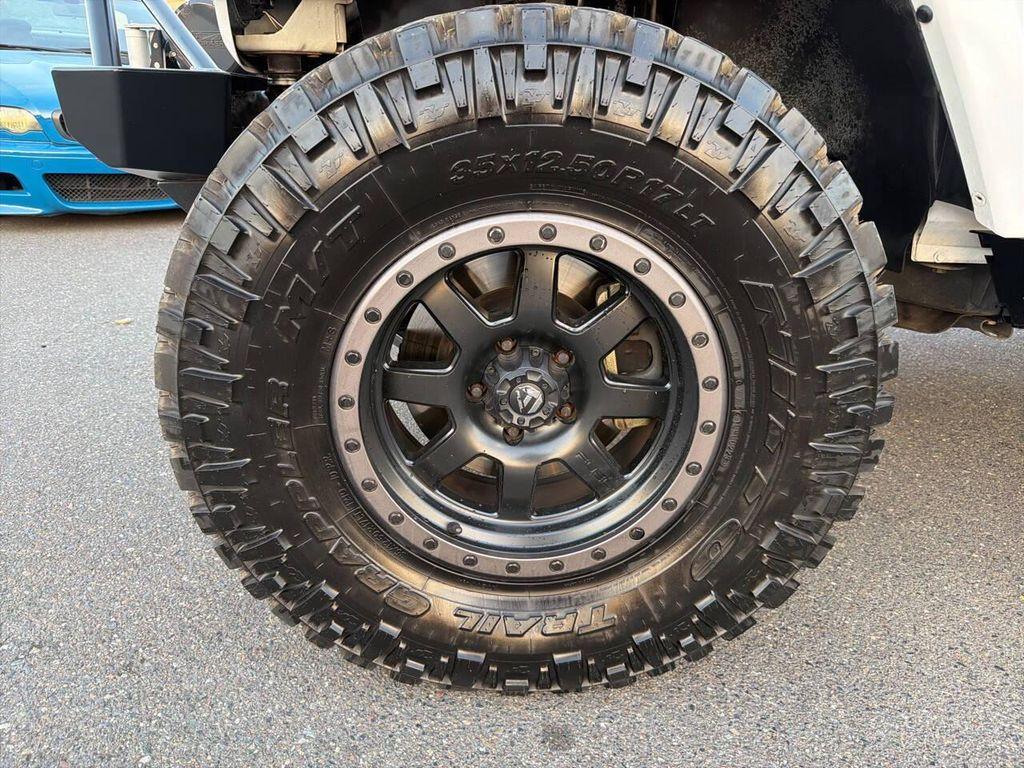 used 2012 Jeep Wrangler Unlimited car, priced at $17,991