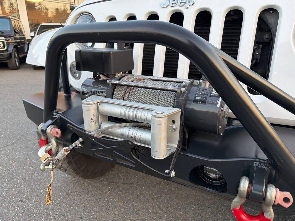 used 2012 Jeep Wrangler Unlimited car, priced at $17,991