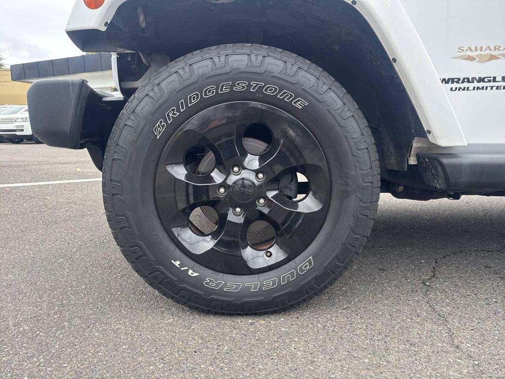 used 2014 Jeep Wrangler Unlimited car, priced at $15,991