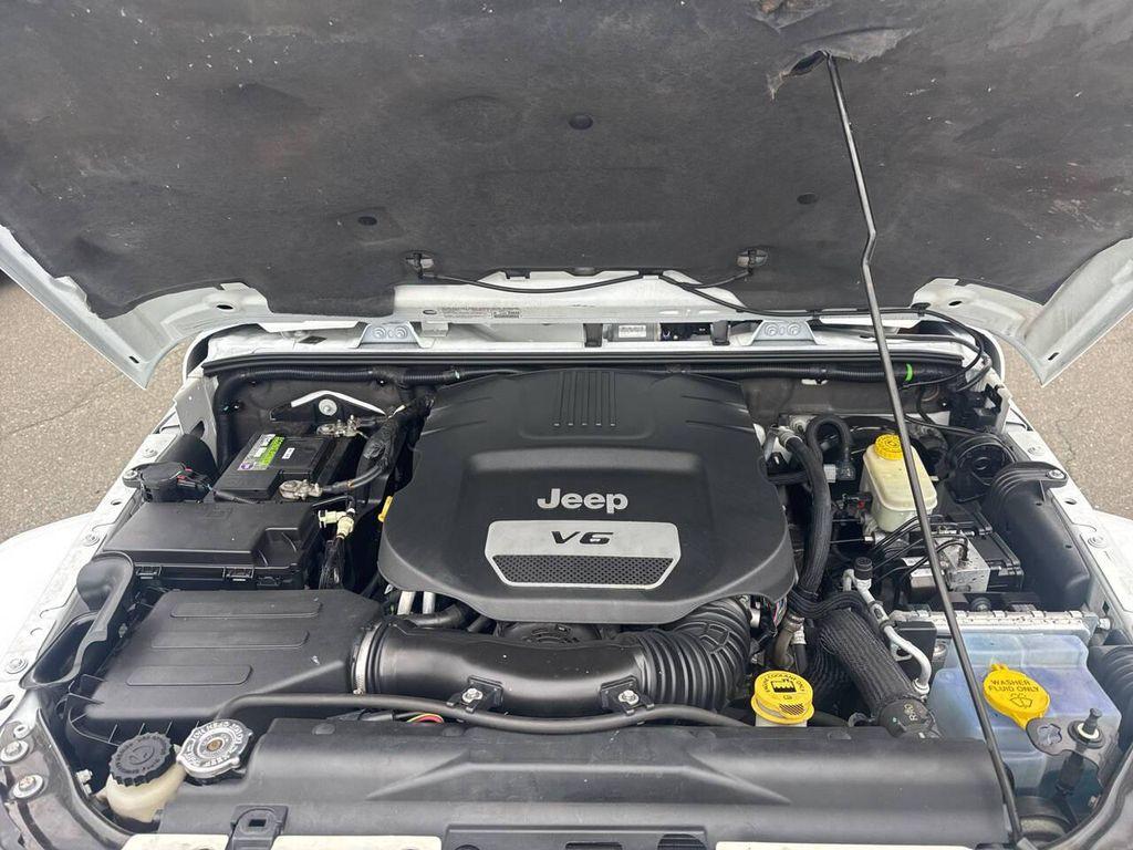 used 2014 Jeep Wrangler Unlimited car, priced at $15,991