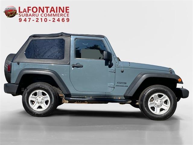 used 2014 Jeep Wrangler car, priced at $17,095