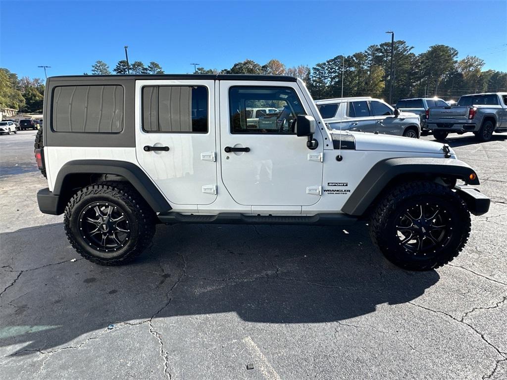 used 2013 Jeep Wrangler Unlimited car, priced at $16,638