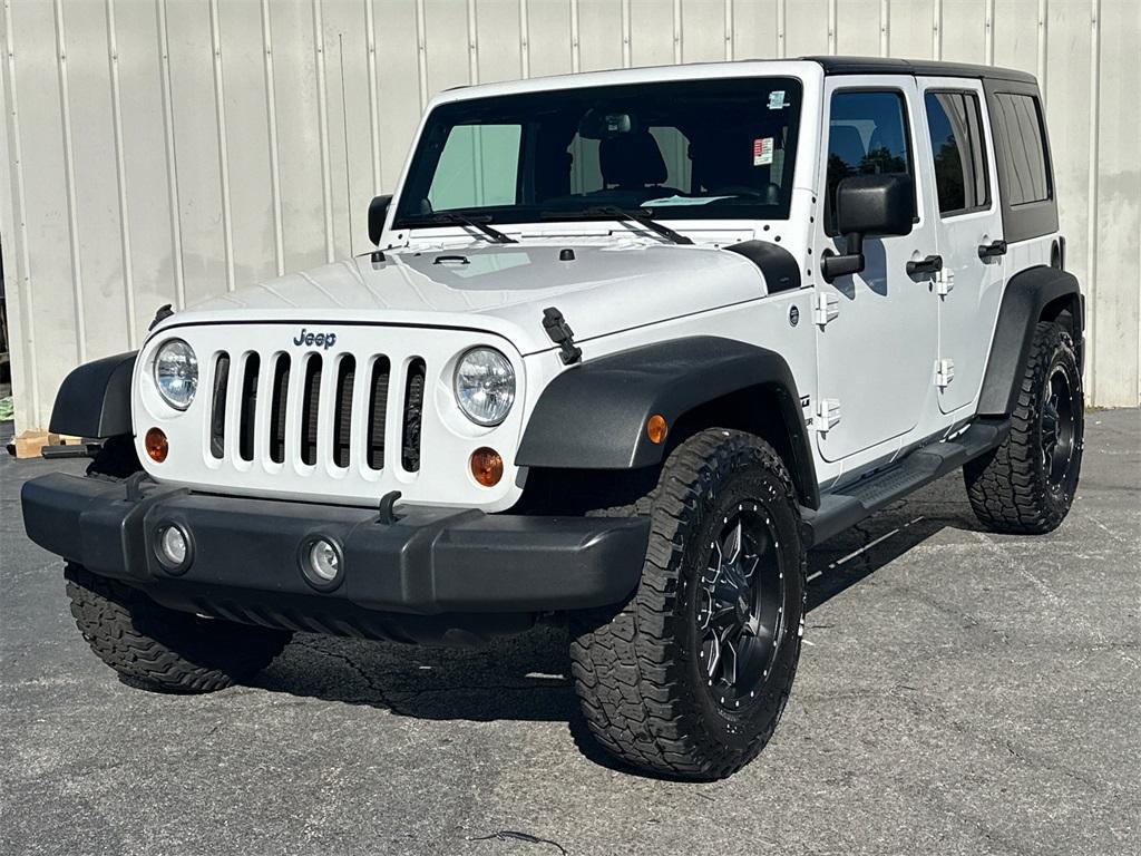 used 2013 Jeep Wrangler Unlimited car, priced at $16,638
