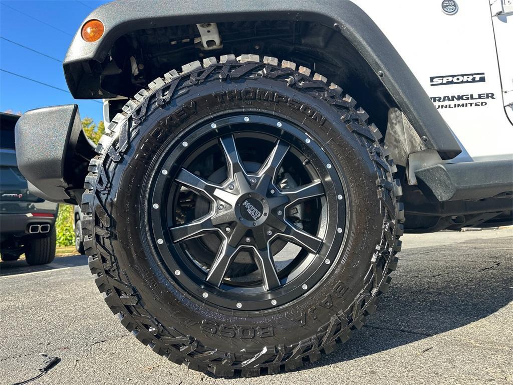 used 2013 Jeep Wrangler Unlimited car, priced at $16,638