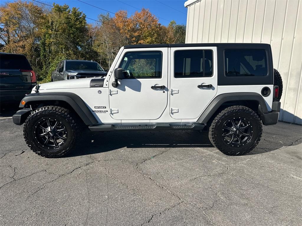 used 2013 Jeep Wrangler Unlimited car, priced at $16,638