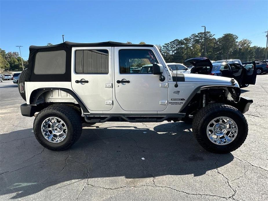 used 2012 Jeep Wrangler Unlimited car, priced at $12,241