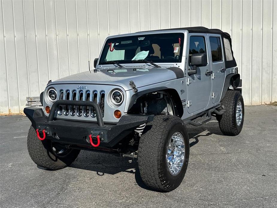 used 2012 Jeep Wrangler Unlimited car, priced at $12,241