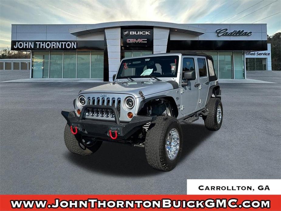 used 2012 Jeep Wrangler Unlimited car, priced at $12,241