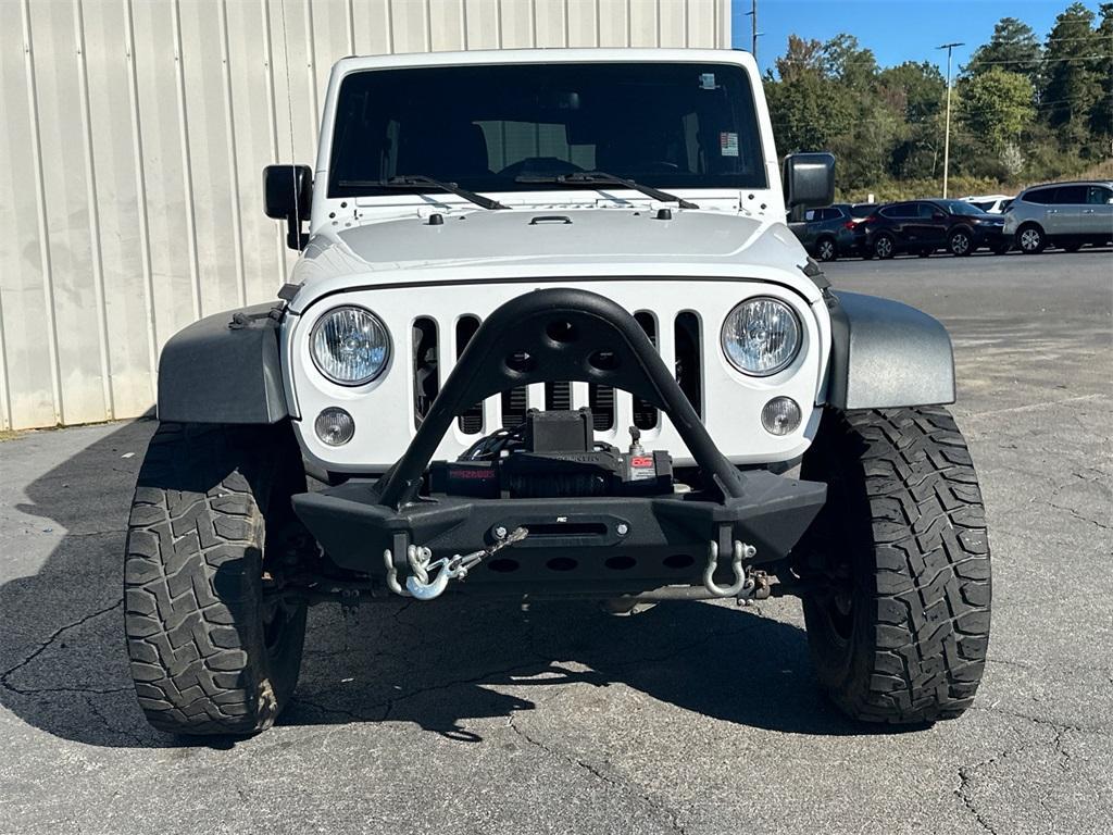 used 2016 Jeep Wrangler Unlimited car, priced at $19,842