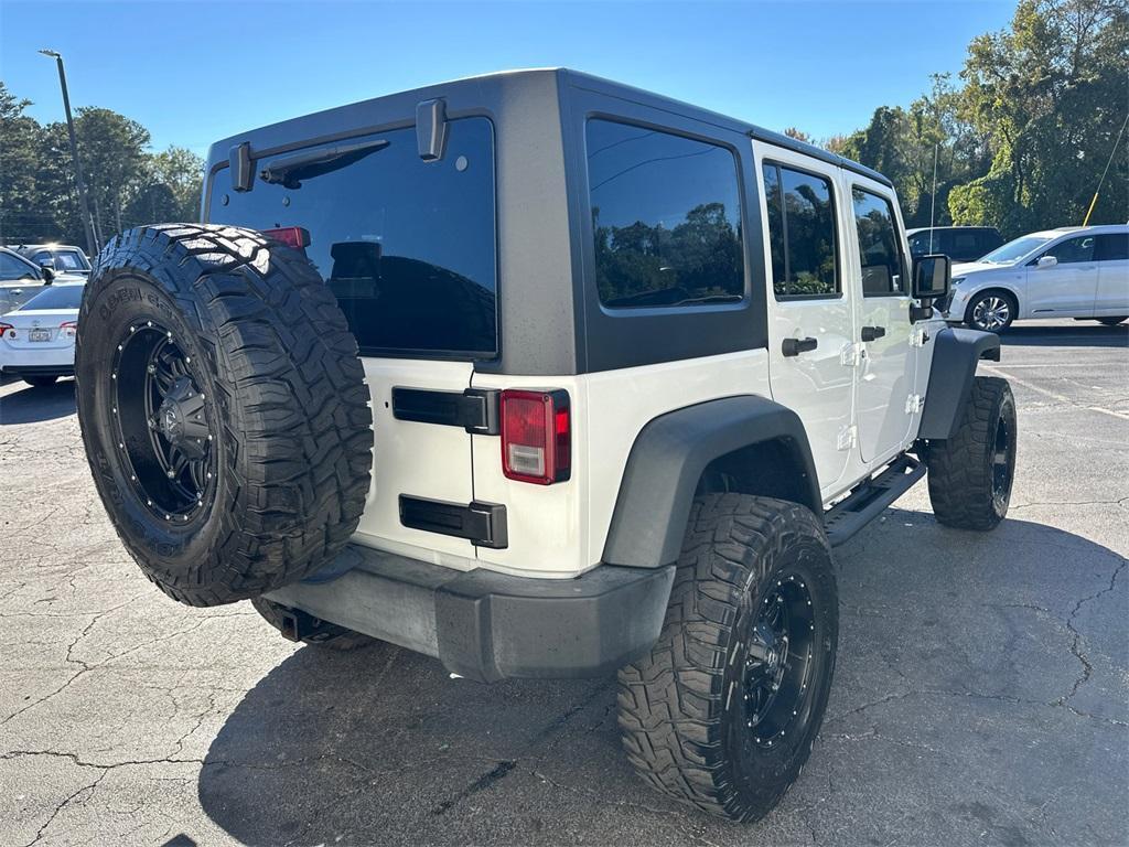 used 2016 Jeep Wrangler Unlimited car, priced at $19,842
