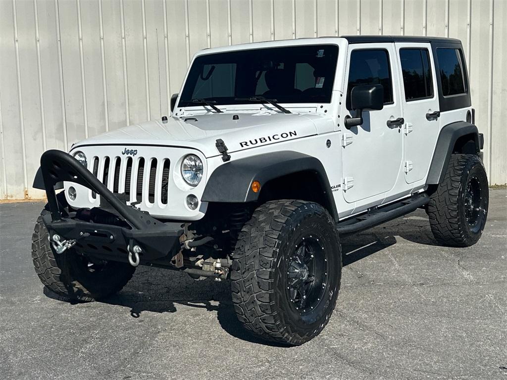 used 2016 Jeep Wrangler Unlimited car, priced at $19,842