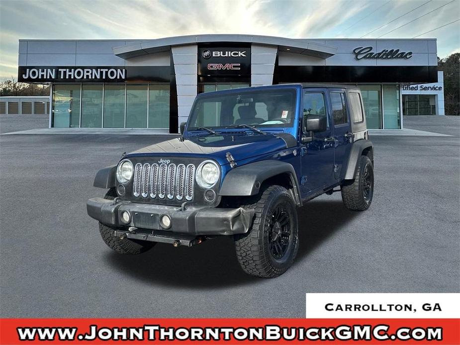 used 2010 Jeep Wrangler Unlimited car, priced at $10,606