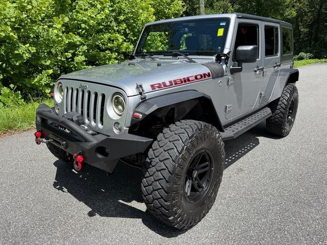 used 2014 Jeep Wrangler Unlimited car, priced at $20,999
